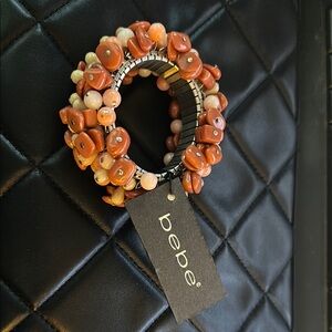 Bebe Vibrant Orange Beaded Cuff